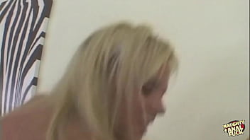 Young blonde bombshell with huge tits loves to deepthroat and ride a big dick