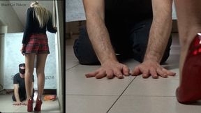 red pumps on hands (detail view)