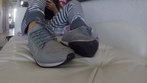 Home from the gym, relaxing on the sofa in sweaty sneakers and no socks SNEAKER FETISH