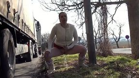 Thick and chunky lady pisses behind the parked truck