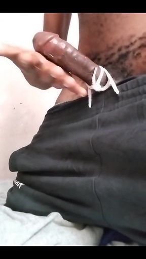Skinny Black Amateur Gently Massaging His Massive Hard Dick in the Morning Part 1