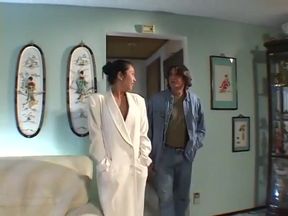 Asian milf gets on her knees and sucks off a white man and gets fucked