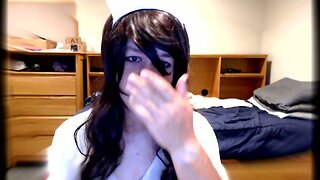 Cute Crossdresser Nurse Blows Dildo