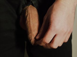 Thick uncut jock growing in ebony jeans. Natural foreskin. Cum on ebony plate.