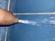 Good clear piss game on the bathroom floor