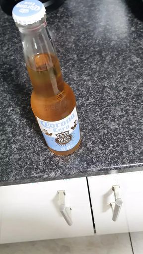Step son after recives a handjob from step mom goes in the kitchen for a cold beer