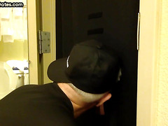 Gloryhole BJ DILF sucks cock with eager mouth near toilet