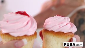 Elsa and Daisy play with some cupcakes and each other