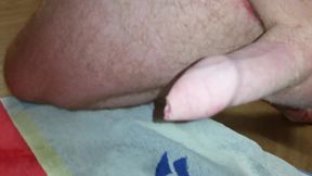 On my knees wanking myself off.as i take my hand off my cock jumps around with my balls aching to shoot their load.i need to finish off my i need to feel cum squirt through my cock out of my pee hole