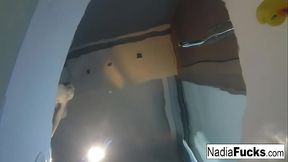 Sexy Nadia takes a bath with some rubber duckies