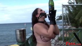 Two dominant dykes dominate busty submissive outdoors