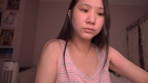 Innocent Chinese girl reads book softly while getting fucked
