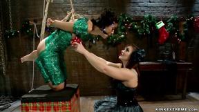 ”MILF lesbian anal fucks bound babe”