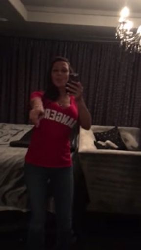 Rachel Starr shakes her dandelion