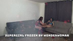 WonderWoman Freezes Supergirl for her pleasure 09