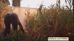 Curvy African farmer girl shows off her sexy ass and harvests crop in the garden