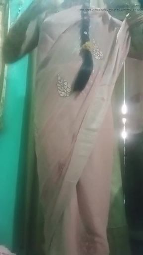 Indian trans woman Gaurisissy pressing and milking her boobs in pink saree