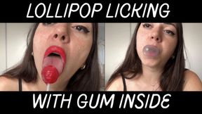 Playing with a lollipop and chewing gum with my mouth in red lipstick