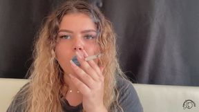Exotic Goddess with Wild Hair Blows Smoke for You