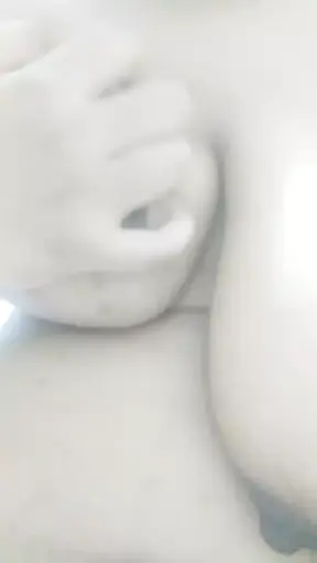 Hot brown girl playing with boobs and sucking nipples