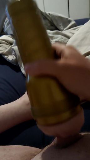 Jerks off with Toy Pussy in Bedroom