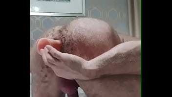 Big hairy muscle guy playing with his toy