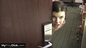 A beautiful brunette hard at work sucking his small cock