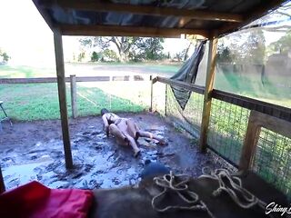 Kinky cuties got hogtied and enjoyed rolling in the mud the other day, in the afternoon