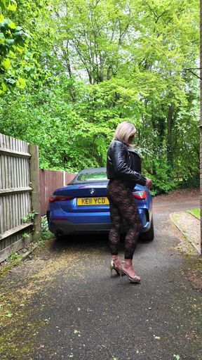 Crossdresser kellycd2022 in black leather jacket and lace catsuit and heels