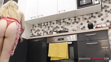 Super sexy petite wife in the kitchen teases a guy by playing his cock and balls to have precum