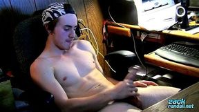 Toned Ty Evans jacks his cock off in front of computer