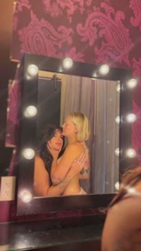 Lesbian boudoir makeout with tits out and tongue