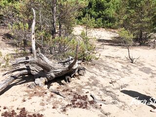 redhead milf pissing in the woods standing on a log 4K 60fps