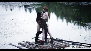 Raven and Bree Daniels are tonguing each other up next to the lake and lovin’ it