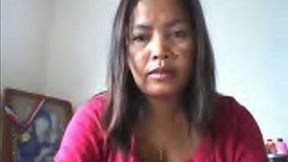 Webcam solo with a chubby exotic milf playing with her tits
