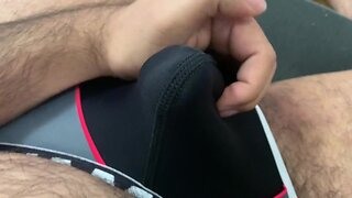 Man wearing too-tight jockstrap until climax in foreskin