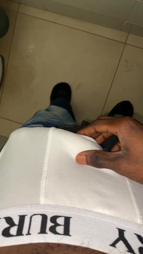 Thug beating his meat in the office