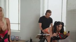 Gym Coach Runs A Spin Class For Two Hot Sluts Who Want His