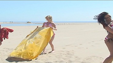 PillowGirls - After beating 2 strangers at beach volleyball, they also fuck them in a lesbian foursome