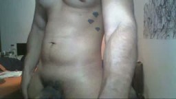 Muscled Latino Plays with His Penis