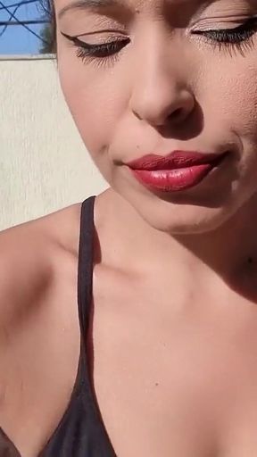 Smoking with Her Breasts Out