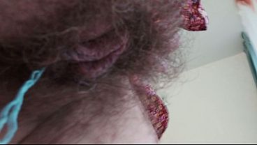 Playing with a tampon in a hairy pussy, close-up