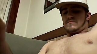 Hairy young amateur strokes his big cock and cums on himself