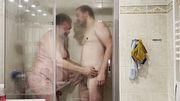 Big daddy and young man in the shower