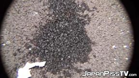 Sexy Asian with knee socks rushes to find a secluded pissing place