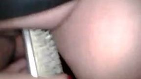Disgusting chubby harlot pokes her muff with hairbrush