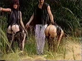 Anita Feller and another female slave outdoor session