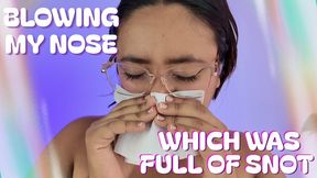 BLOWING MY NOSE WICH WAS FULL OF SNOT