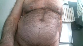 Coach Karl Shows off His Furry Belly