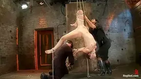 Tiny flexible brunette suffers a Category 5 suspension while being made to cum over and over!